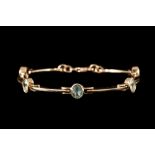 AN AQUAMARINE SET BRACELET,