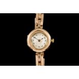 A LADIES GOLD WATCH,