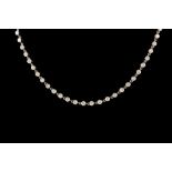 A DIAMOND LINE NECKLACE BY CARTIER, with diamonds of approx. 9.