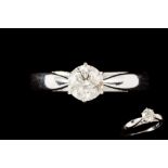 A DIAMOND SOLITAIRE RING,