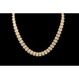 A 9CT YELLOW GOLD FIVE ROW BRICK LINK NECKLACE,