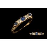 A FIVE STONE DIAMOND AND SAPPHIRE RING,