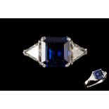 A SAPPHIRE AND DIAMOND THREE STONE RING, with sapphire of approx. 1.80ct, diamonds of approx. 0.