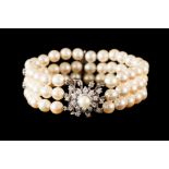 A DIAMOND AND PEARL TRIPLE ROW CUFF BRACELET