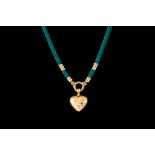 A FANCY COLOURED DIAMOND SET HEART PENDANT, in 18ct yellow gold,