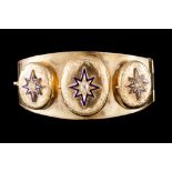 A VICTORIAN BANGLE, with graduating triple lockets, set with enamel and oval cut diamonds,