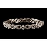 A DIAMOND SET LINK BRACELET, of approx. 4.