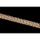 A 14CT YELLOW AND ROSE GOLD FIVE ROW BRACELET.