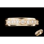 A DIAMOND SET ETERNITY BAND,