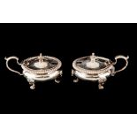 A PAIR OF SILVER MUSTARD POTS,