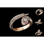 AN EARLY 19TH CENTURY COILED SNAKE DRESS RING, set throughout with rose cut diamonds.