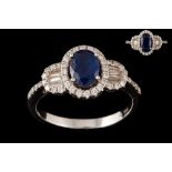 A SAPPHIRE AND DIAMOND TRIPLE CLUSTER RING,