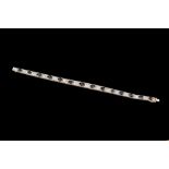 A SAPPHIRE GRADUATED LINE BRACELET, with sapphires of approximately 18.00ct, mounted in white gold.