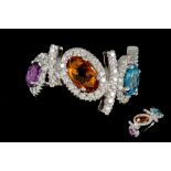 A CITRINE, AMETHYST, BLUE TOPAZ AND DIAMOND DRESS RING,