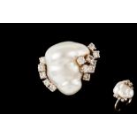 A DIAMOND AND PEARL DRESS RING,