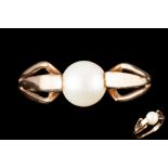 A CULTURED PEARL DRESS RING,