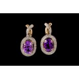 A PAIR OF AMETHYST EARRINGS,