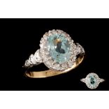 AN AQUAMARINE AND DIAMOND CLUSTER RING, an aquamarine of approx. 1.50ct and diamonds of approx 0.