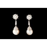 A PAIR OF CULTURED PEARL AND DIAMOND DROP EARRINGS, set throughout with diamonds of approx 1.