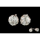 A PAIR OF DIAMOND SOLITAIRE STUD EARRINGS, two old European brilliant cut diamonds of approx 1.