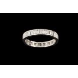 A DIAMOND FULL ETERNITY RING, with baguette cut diamonds,