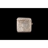 A GEORGE V STERLING SILVER VESTA CASE, with chased and engraved decoration,