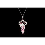 AN ART DECO RUBY AND DIAMOND PENDANT, with rubies of approx 3.