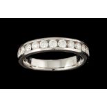 A DIAMOND HALF ETERNITY RING, mounted in platinum,