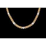 A DIAMOND SET NECKLACE,