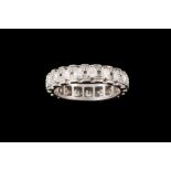 A DIAMOND FULL ETERNITY RING,