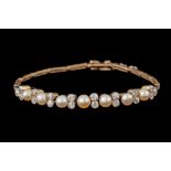 AN EDWARDIAN PEARL AND DIAMOND BRACELET,