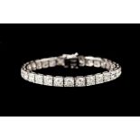 A DIAMOND LINE BRACELET, with diamonds of approx. 15.30ct in total H/I SI, mounted in 18ct white