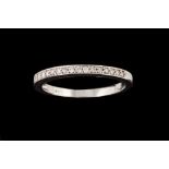 A DIAMOND HALF ETERNITY RING,