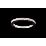 A DIAMOND HALF ETERNITY RING