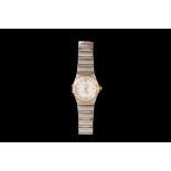 A LADIES DIAMOND SET OMEGA CONSTELLATION WRIST WATCH