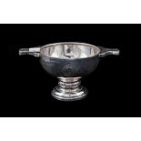 A MODERN SILVER TRIM HANDLED QUAICH,