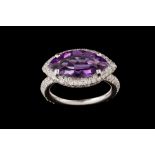 AN AMETHYST AND DIAMOND RING, one marquise cut amethyst of approx 3.00ct and diamonds of approx 2.