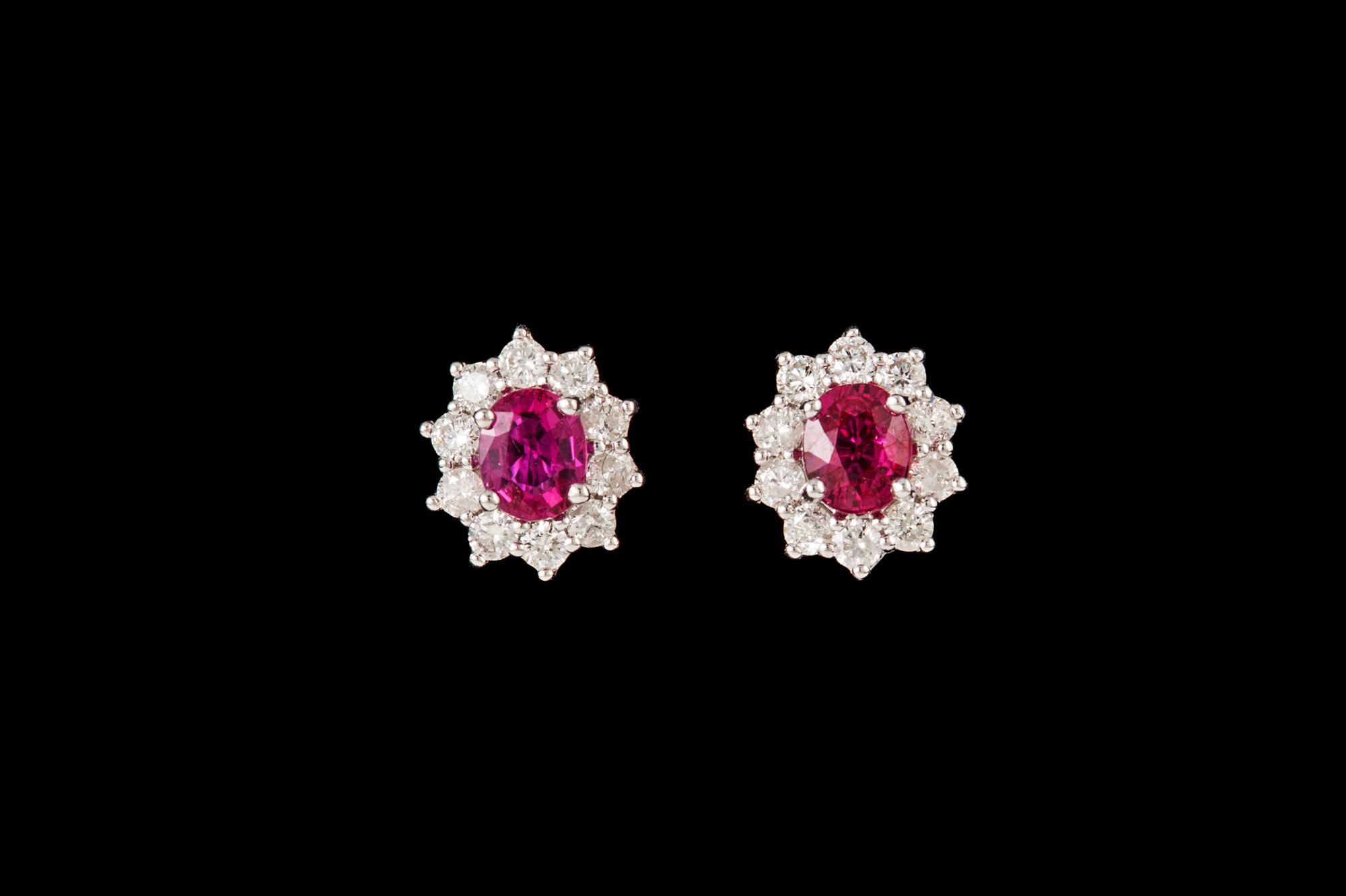 A PAIR OF DIAMOND AND RUBY CLUSTER EARRINGS,