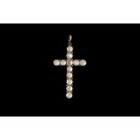 A MOONSTONE SET CROSS, in 14ct gold.