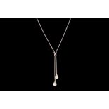 A DIAMOND AND CULTURED PEARL SET PENDANT,