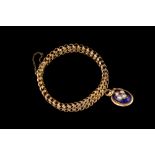 AN ANTIQUE 9CT GOLD WOVEN BRACELET, with pearl,