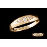 A DIAMOND SET BAND RING, mounted on 18ct gold,