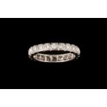 A DIAMOND ETERNITY RING,