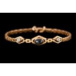 A SAPPHIRE AND DIAMOND BRACELET, one oval cabochon sapphire of approx. 1.