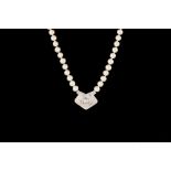 A PEARL AND DIAMOND NECKLACE, with single row cultured pearl strand, suspending a diamond cluster of