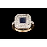 A SAPPHIRE AND DIAMOND CLUSTER RING, with one square cut sapphire of approx. 1.