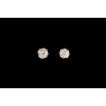 A PAIR OF DIAMOND SOLITAIRE EARRINGS, of approx. 0.