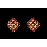 A PAIR OF GARNET CUSHION SHAPE STUD EARRINGS, mounted in 14ct gold.