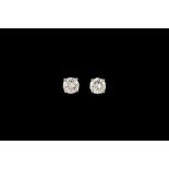 A PAIR OF DIAMOND SOLITAIRE EARRINGS, of approx. 2.