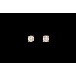 A PAIR OF DIAMOND SOLITAIRE EARRINGS, of approx. 0.